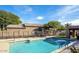 Inviting community pool with ample seating and well-maintained landscaping at 23046 N 88Th Way, Scottsdale, AZ 85255