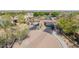 Inviting entrance to the community with decorative gate and lush landscaping at 2361 N 156Th Dr, Goodyear, AZ 85395