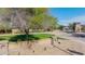 Community entrance features decorative landscaping, manicured lawns and water features at 2361 N 156Th Dr, Goodyear, AZ 85395