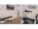 Another view of the exercise room with a treadmill and weight bench at 2361 N 156Th Dr, Goodyear, AZ 85395