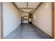 Organized two-car garage with ample workspace, tool storage, and a clean, well-maintained floor at 2361 N 156Th Dr, Goodyear, AZ 85395