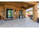Outdoor patio featuring a stainless steel grill and mini-fridge, perfect for summer barbecues at 2361 N 156Th Dr, Goodyear, AZ 85395
