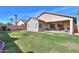 A view of the private backyard with a covered patio at 241 W Atlantic Dr, Casa Grande, AZ 85122