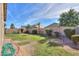 Large backyard featuring low-maintenance landscaping and a private block fence at 241 W Atlantic Dr, Casa Grande, AZ 85122