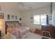 Warm and inviting bedroom with ample light, closet, ceiling fan and coordinated linens at 241 W Atlantic Dr, Casa Grande, AZ 85122