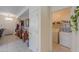 Hallway with a laundry closet and access to the front door at 241 W Atlantic Dr, Casa Grande, AZ 85122