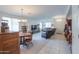 Open-concept living area with dining space, plush seating, and ample natural light at 241 W Atlantic Dr, Casa Grande, AZ 85122