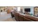 Comfortable living room featuring a neutral color palette, tile floors, and abundant natural light at 241 W Atlantic Dr, Casa Grande, AZ 85122