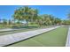 Well-kept outdoor bocce ball court with pristine landscaping and inviting pathways for leisurely games at 27196 N 129Th Dr, Peoria, AZ 85383