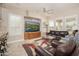 Comfortable living room with plush seating, neutral color palette, and views of the outdoors at 27196 N 129Th Dr, Peoria, AZ 85383