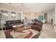 Open concept living room with great natural light and ample seating at 27196 N 129Th Dr, Peoria, AZ 85383
