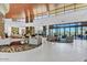 Elegant lobby with high ceilings and floor-to-ceiling windows, creating a bright and airy space at 27196 N 129Th Dr, Peoria, AZ 85383