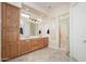 Spacious main bathroom with dual vanities and a glass-enclosed shower at 27196 N 129Th Dr, Peoria, AZ 85383
