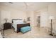 Cozy main bedroom features plush bedding, a soft rug, and great natural light at 27196 N 129Th Dr, Peoria, AZ 85383