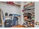 Organized walk-in closet offering generous storage with shelves and hanging space at 2859 E Cathy Dr, Gilbert, AZ 85296