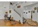 Inviting living area with stairs, high ceilings, wood floors and artistic decor at 2859 E Cathy Dr, Gilbert, AZ 85296