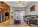Comfortable living room featuring patio access, built-in shelves and cozy furniture at 2859 E Cathy Dr, Gilbert, AZ 85296