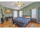 Spacious main bedroom featuring unique decor and hardwood floors at 2859 E Cathy Dr, Gilbert, AZ 85296