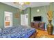 Relaxing main bedroom with a TV and comfortable furnishings at 2859 E Cathy Dr, Gilbert, AZ 85296