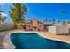 Outdoor area featuring a pool, patio, and well-maintained landscaping at 2942 E Mulberry Dr, Phoenix, AZ 85016
