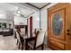 Elegant dining area with a classic wooden table and seating for six, perfect for Gathering meals and gatherings at 2942 E Mulberry Dr, Phoenix, AZ 85016