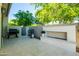 Spacious backyard features a built-in fireplace and two grills, perfect for outdoor entertaining at 2973 E Austin Dr, Gilbert, AZ 85296