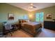 Bedroom with desk, chair, and closet, providing a comfortable space at 2973 E Austin Dr, Gilbert, AZ 85296