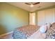 Bedroom with carpet floors, ceiling fan and a view of the hallway at 2973 E Austin Dr, Gilbert, AZ 85296