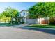 Charming two-story home with lush trees, a well-maintained lawn, and a spacious driveway in a peaceful neighborhood at 2973 E Austin Dr, Gilbert, AZ 85296