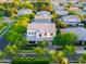 Charming two-story home featuring a well-manicured lawn and a paved driveway at 2973 E Austin Dr, Gilbert, AZ 85296