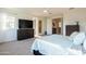 Bright main bedroom with a ceiling fan, and carpeted floor at 2973 E Austin Dr, Gilbert, AZ 85296