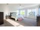Bright, spacious main bedroom with ample natural light, neutral tones and carpet at 2973 E Austin Dr, Gilbert, AZ 85296