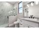 Modern bathroom has a glass shower with marble walls at 3046 W Redwood Ln, Phoenix, AZ 85045