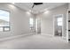 Spacious bedroom with many windows and a ceiling fan at 3046 W Redwood Ln, Phoenix, AZ 85045