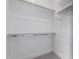 Walk-in closet with built-in shelving offers great storage at 3046 W Redwood Ln, Phoenix, AZ 85045