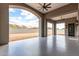 Spacious covered patio provides shade and features a mountain view and ceiling fans for outdoor living at 3046 W Redwood Ln, Phoenix, AZ 85045