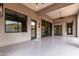 Extensive covered patio features multiple entrances and ceiling fans, offering a serene outdoor retreat at 3046 W Redwood Ln, Phoenix, AZ 85045