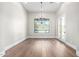 Bright dining area with large window and chandelier at 3046 W Redwood Ln, Phoenix, AZ 85045