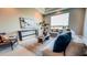 Inviting living room featuring stylish furniture, decor, and ample natural light at 3046 W Redwood Ln, Phoenix, AZ 85045