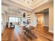Bright, open living room with modern fireplace, wood floors, and stylish decor at 3046 W Redwood Ln, Phoenix, AZ 85045