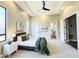 Bright and airy main bedroom suite with large windows, ensuite bathroom, and modern decor at 3046 W Redwood Ln, Phoenix, AZ 85045