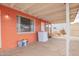 The covered back porch has a washing machine at 3149 N 40Th Ln, Phoenix, AZ 85019