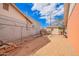 Backyard featuring a dirt area, a storage shed, and CMU blocks at 3149 N 40Th Ln, Phoenix, AZ 85019