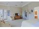 Large main bedroom with comfortable sitting area and exterior access at 33242 N 68Th Pl, Scottsdale, AZ 85266