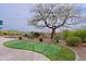 Backyard putting green is surrounded by lush landscaping, ideal for practicing your golf game in a private setting at 33242 N 68Th Pl, Scottsdale, AZ 85266