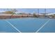 Community basketball court with a smooth surface and well-maintained surroundings for sports enthusiasts at 37185 N Falabella Dr, San Tan Valley, AZ 85140