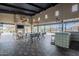 Spacious outdoor patio with fireplace, tv, and eating area, perfect for entertaining and relaxing at 37185 N Falabella Dr, San Tan Valley, AZ 85140