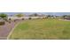 Scenic community park with lush green spaces and walking paths, perfect for outdoor recreation and relaxation at 37185 N Falabella Dr, San Tan Valley, AZ 85140