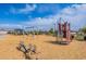 Well-equipped playground with swings, climbing frames, and seesaws for children to enjoy at 37185 N Falabella Dr, San Tan Valley, AZ 85140
