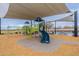 Community playground with climbing structures, slides, and a basketball court, perfect for active play at 37185 N Falabella Dr, San Tan Valley, AZ 85140